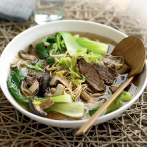 Beef noodle soup with mushrooms