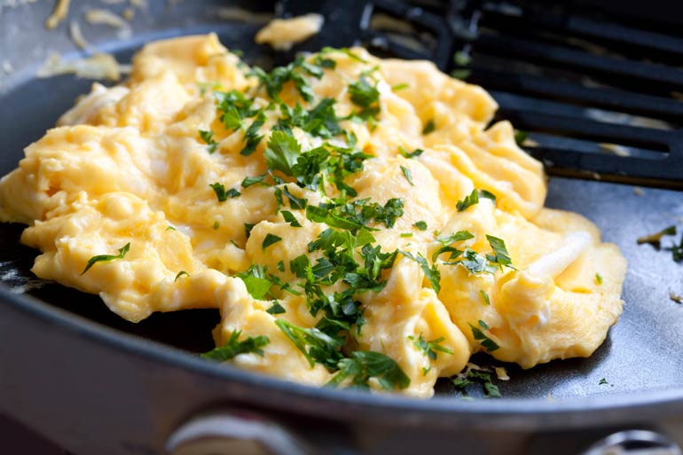 Cook scrambled eggs