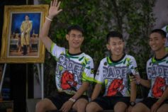 Ekkapol Chantawong (Left), coach of the 'Wild Boars' soccer team speak during a press conference for the first time since they were rescued from a cave in northern Thailand