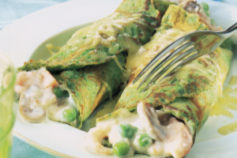 Spinach pancakes with smoked trout and prawns