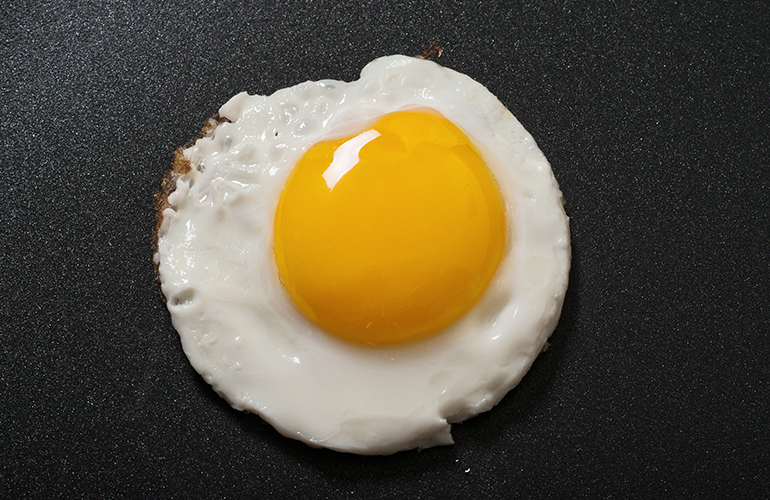 Letting eggs stick to the pan