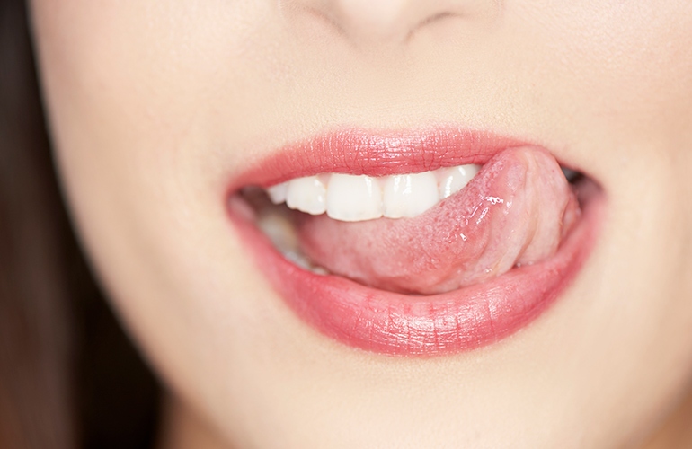 Under your tongue