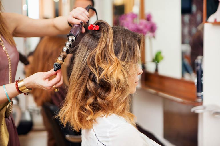 Always dry your hair completely before using a hot tool like a curling iron or a flat iron