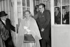 man opening a door for a woman