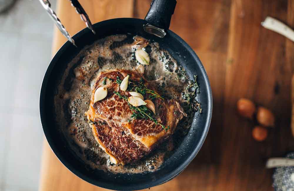 Flipping meat too soon (and too often)