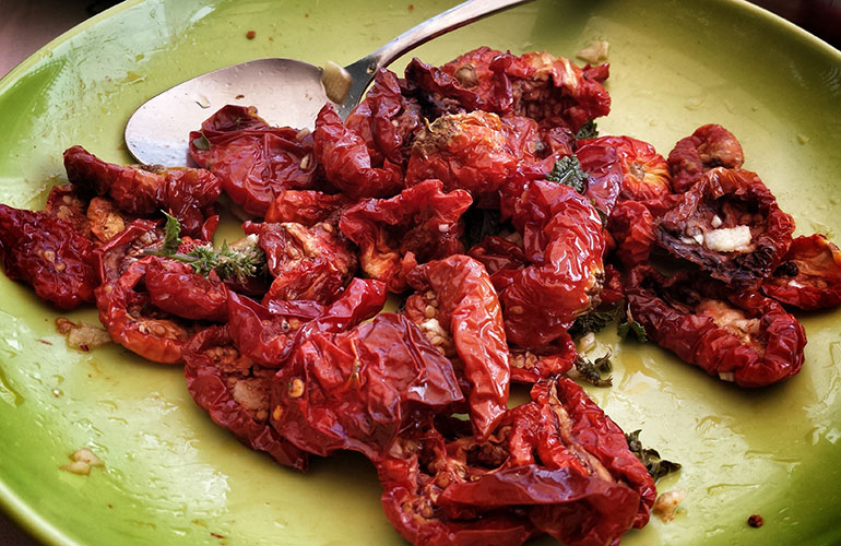 Sun-dried tomatoes (1 cup of dried tomatoes = 7.6 grams of protein)