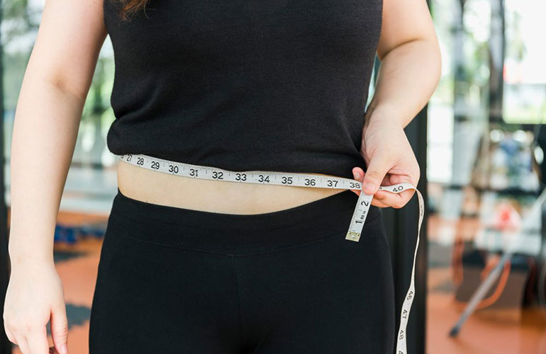 What helps hot flashes: weight loss
