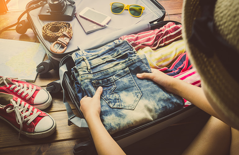 Use a pillowcase as a laundry bag while travelling