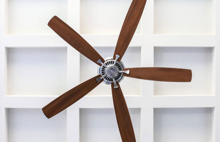 Use a pillowcase to dust ceiling fan blades