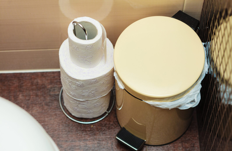 Command your garbage bag stay in the bin