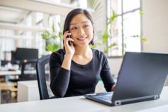 woman talking on iphone