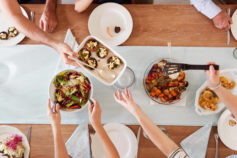 passing food at a dinner party