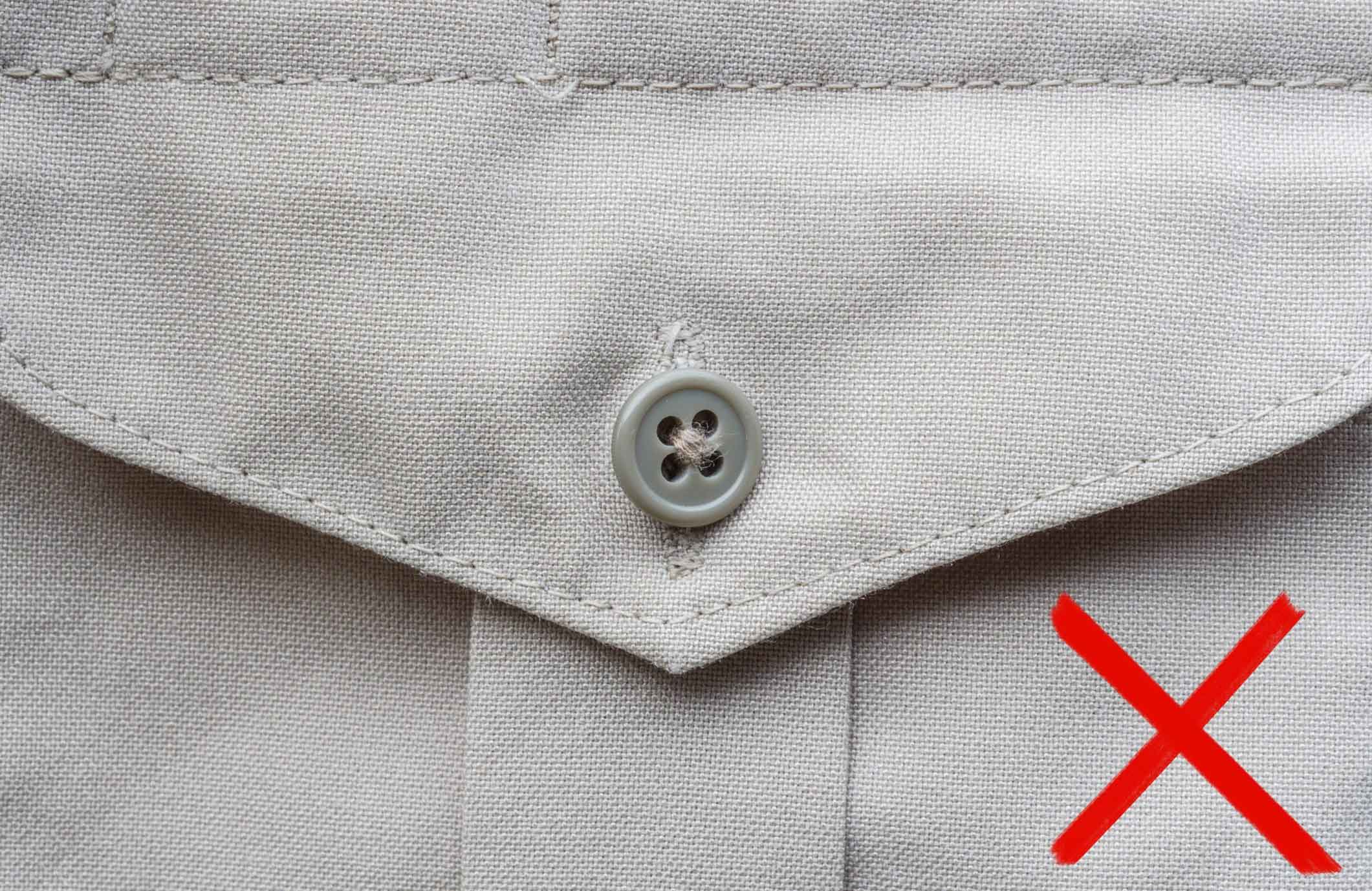You should fasten buttons before washing