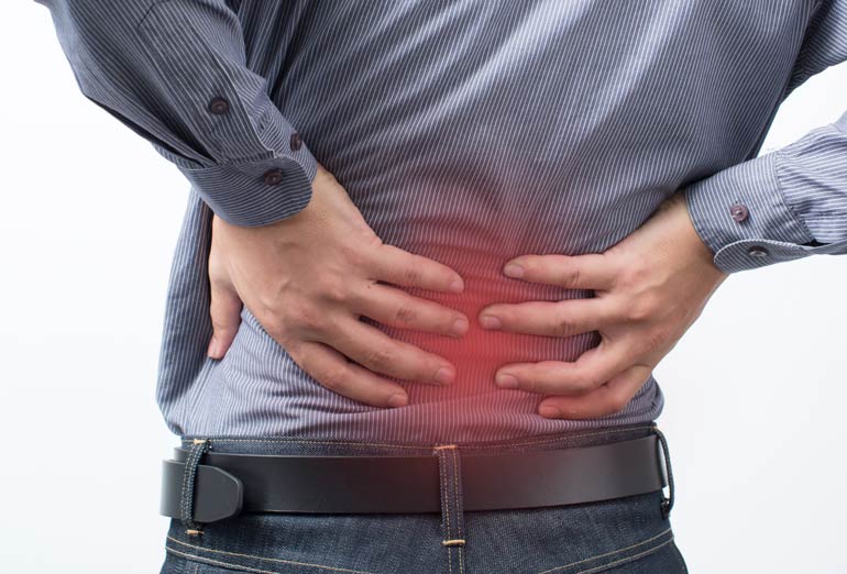 Your back hurts while you’re standing in line