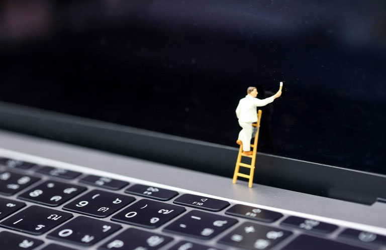You pick your laptop up by the screen