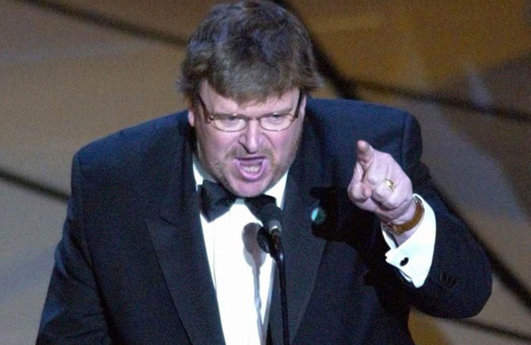Michael Moore is booed during his acceptance speech at the 75th Academy Awards