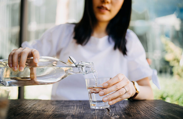 Drink at least eight glasses of water a day