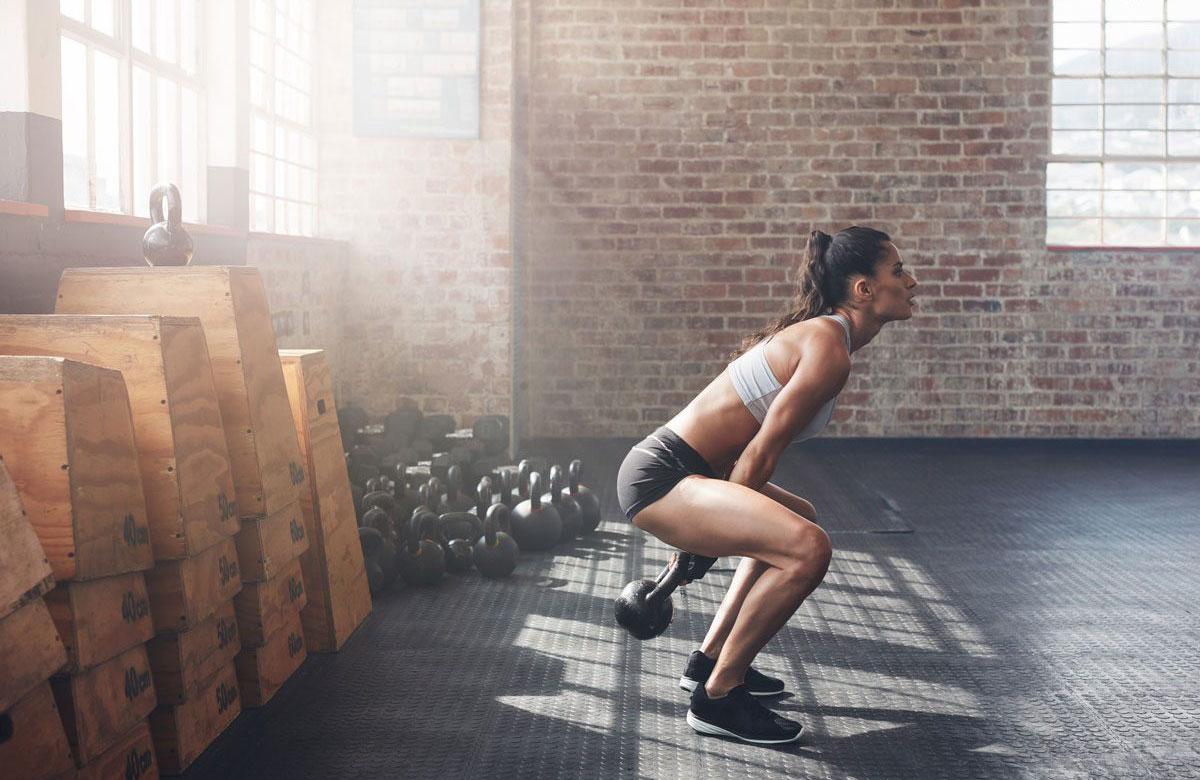 Best arm exercises: two-arm kettlebell swing